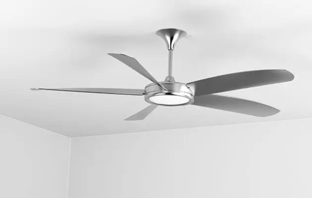 Silver ceiling fan on white ceiling